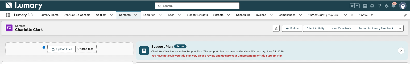 Support Plan component at the top of the client record with arrow to open the active support plan